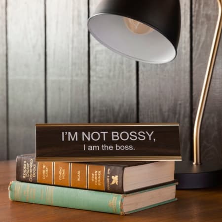I'm Not Bossy Name Plate On Top Of Books