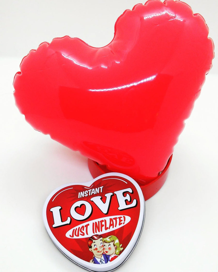 Inflatable Heart Sitting In Gift Tin